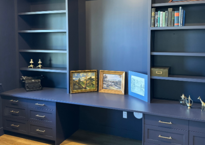 Custom cabinetry with dark painted finish