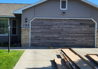 Garage door and front exterior with fresh coating