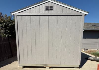 Storage shed with uniform exterior paint finish