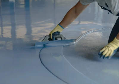 Epoxy floor coating in industrial space with reflective finish