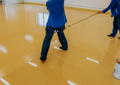 Yellow epoxy floor coating in workspace