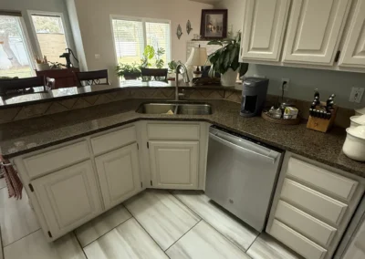 Kitchen interior with white cabinets and clean paintwork